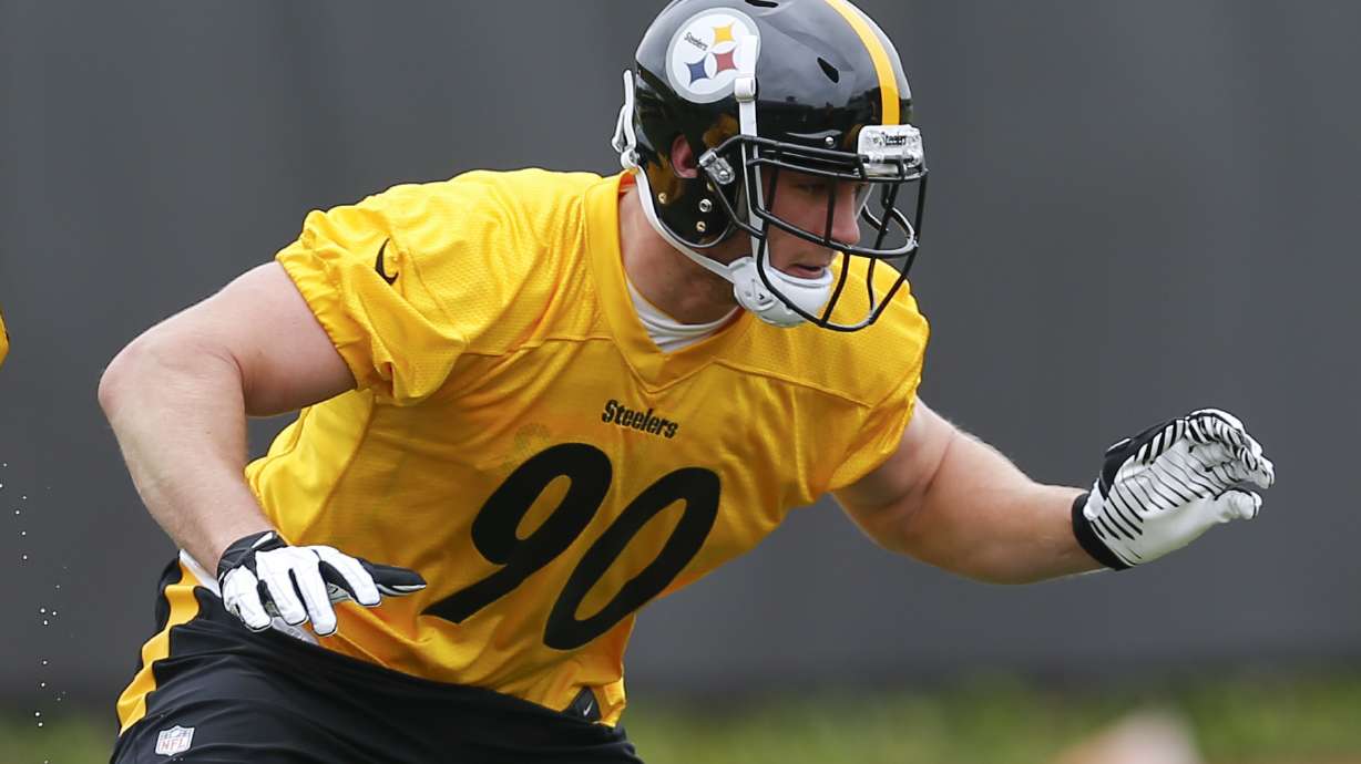 FILE - Pittsburgh Steelers first round draft pick linebacker T.J. Watt participates in a drill during an NFL football rookie minicamp, May 12, 2017, in Pittsburgh.