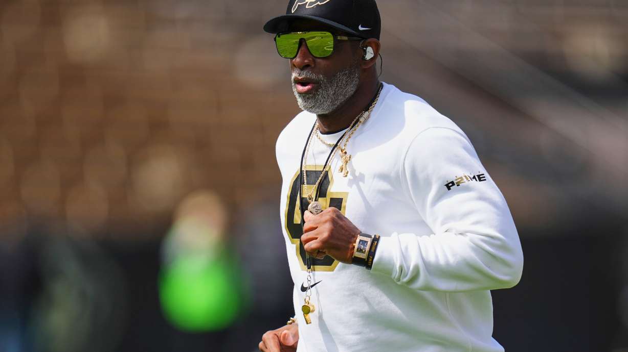 FILE - Colorado head coach Deion Sanders takes the field during an NCAA college football spring game, Saturday, April 19, 2025, in Boulder, Colo.