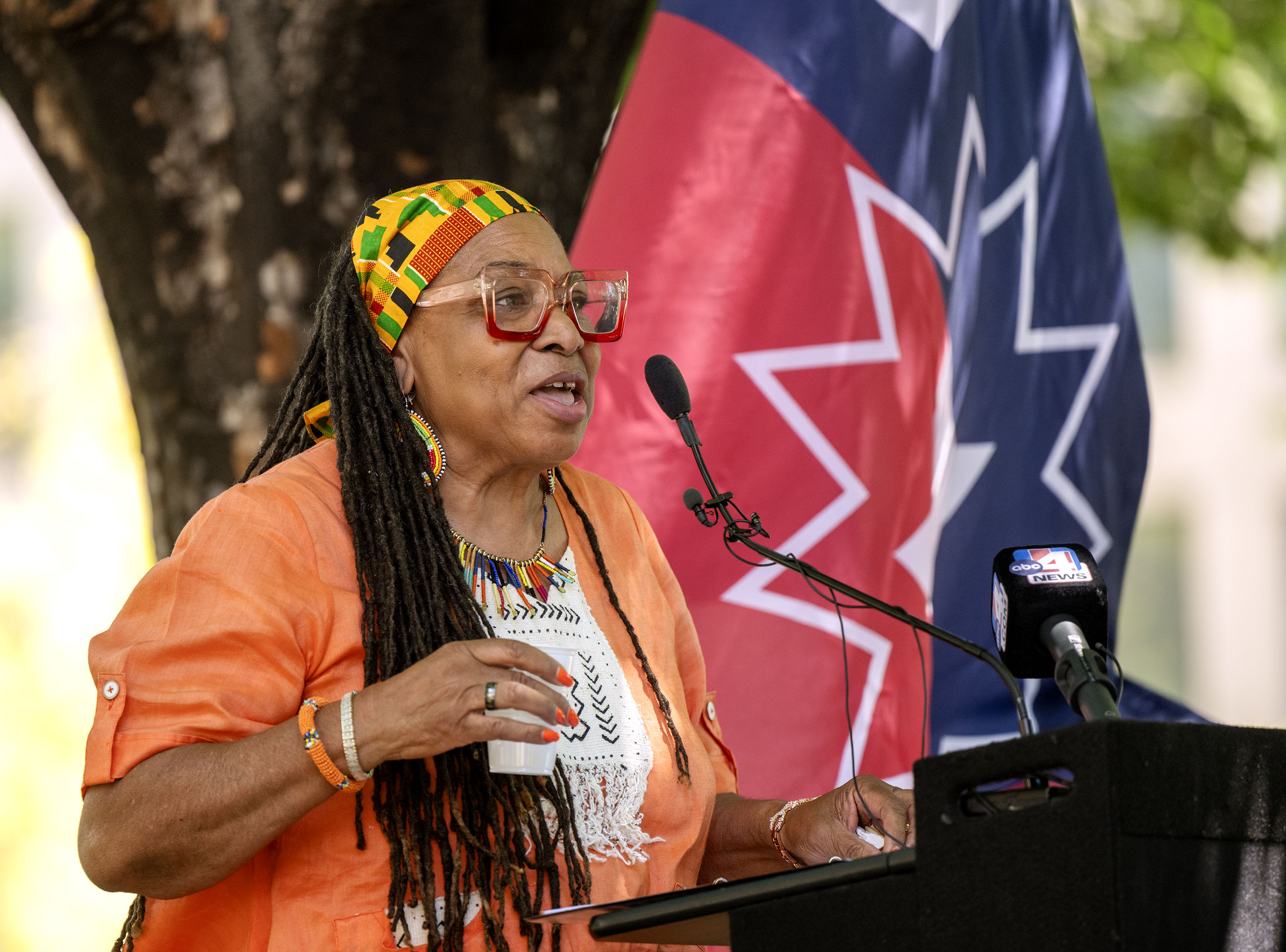 Betty Sawyer, executive director of the Project Success Coalition, speaks as Salt Lake City officials join community leaders for an early celebration of Juneteenth at City Hall, Tuesday. The event included a reading of General Order No. 3 and the inaugural raising of the Sego Celebration flag, as well as other speakers.