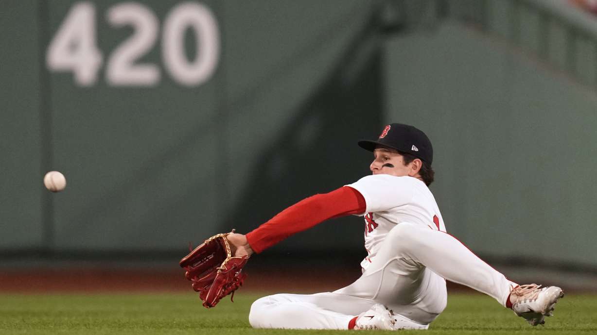 Boston Red Sox outfielder Roman Anthony makes the catch on a fly out by Tampa Bay Rays' Jonathan Aranda during the sixth inning of a baseball game at Fenway Park, Tuesday, June 10, 2025, in Boston.