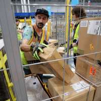 Amazon's Marriott-Slaterville facility is finally operating, ramping up to 336,000 deliveries a week