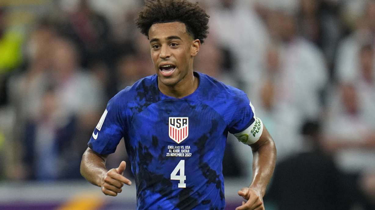 FILE - Tyler Adams of the United States runs on the pitch during the World Cup group B soccer match between England and The United States, at the Al Bayt Stadium in Al Khor, Qatar, on Nov. 25, 2022.