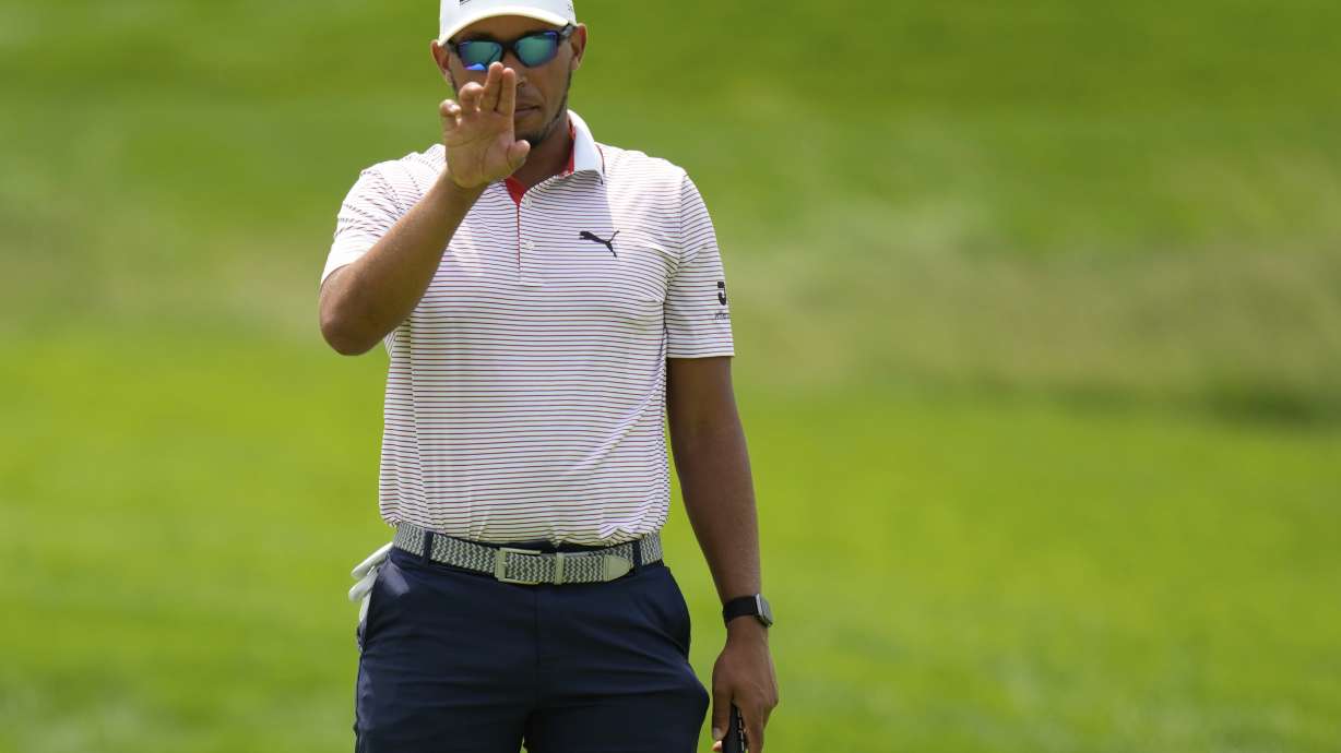 Chase Johnson lines up a putt on the fifth hole during a practice round ahead of the U.S. Open golf tournament at Oakmont Country Club Tuesday, June 10, 2025, in Oakmont, Pa.