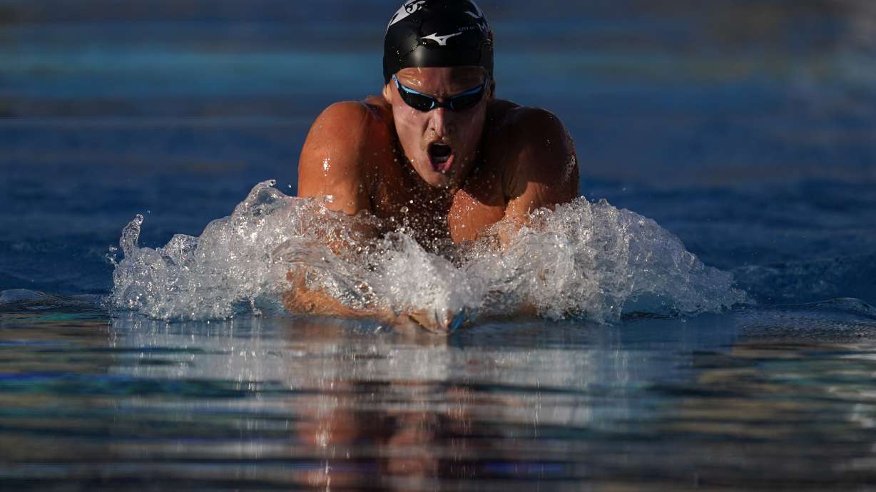 FILE - Grant House competes in the men's 200-meter IM final at the TYR Pro Swim Series swim meet on Saturday, June 4, 2022, in Mission Viejo, Calif.