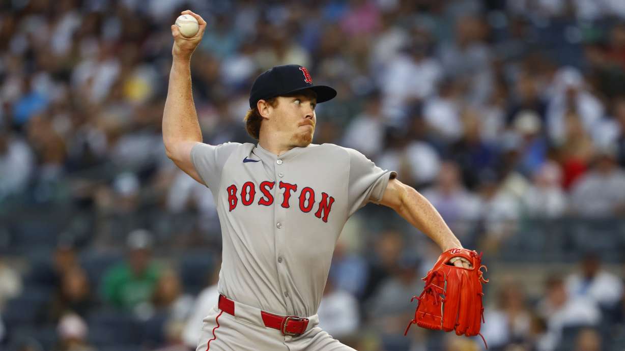 Boston Red Sox pitcher Hunter Dobbins (73) throws against the New York Yankees during the first inning of a baseball game, Sunday, June 8, 2025, in New York.