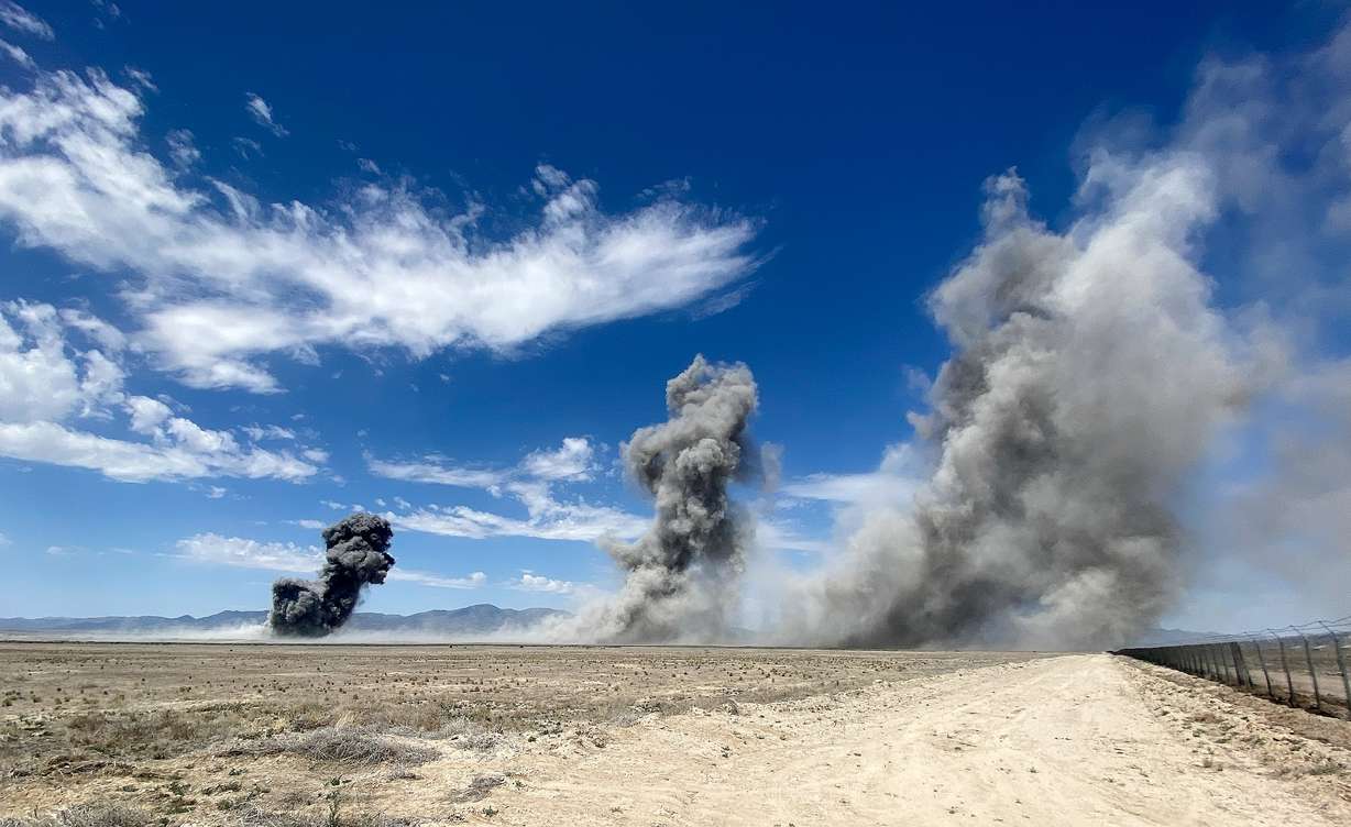 Dust clouds rise after ammunition scheduled for demilitarization explodes during open detonations at the Tooele Army Depot in Tooele County on Wednesday.