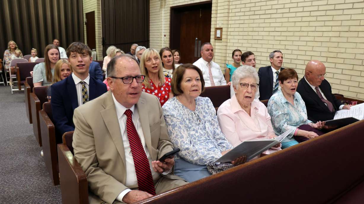 Members of The Church of Jesus Christ of Latter-day Saints sing selections from “Hymns—For Home and Church” during their sacrament meeting in Murray, Utah, on June 1, 2025. On Thursday, 12 more hymns were added to the book.
