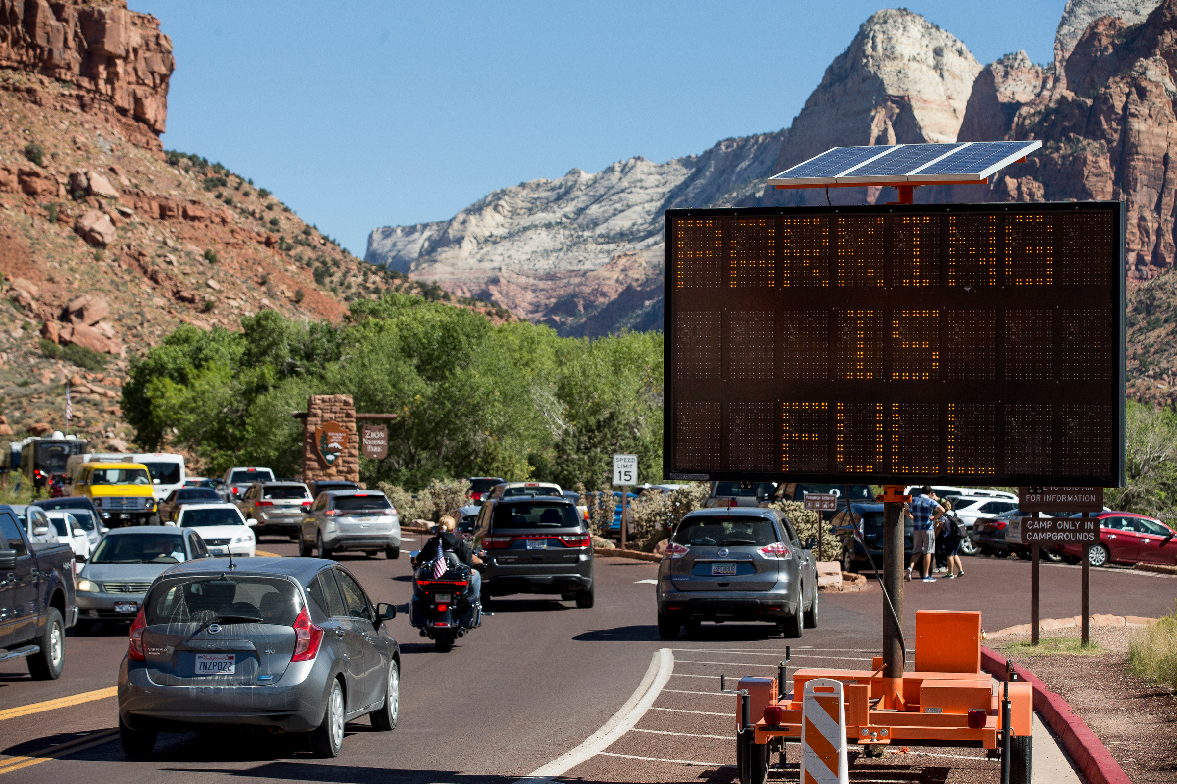 An electronic sign indicates that parking at the Zion National Park Visitor Center is full on Sept. 15, 2016.