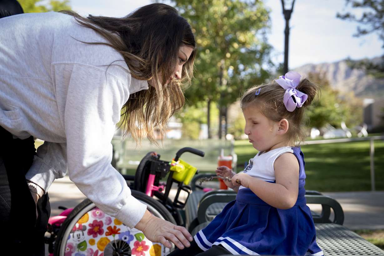 Kari Harbath talks with her daughter Sloan on Sept. 23, 2024. The Harbath sisters created a scholarship fund for their late mother who loved Weber State University.