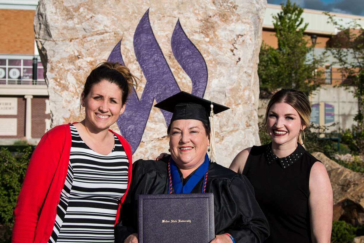 Kassie and Kari Harbath celebrate their mother Kim's graduation from Weber State University. After their mother died, the sisters created a scholarship fund in her name since she loved Weber State University.