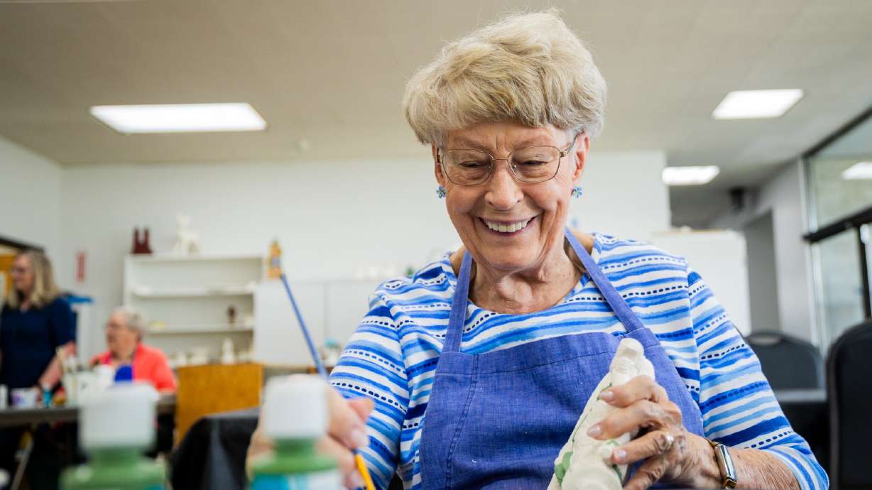 Carla McIntire laughs during a senior ceramics class at the Murray City Senior Recreation Center on June 5. The smiles in the class were an example of why Caring.com ranked Utah as the happiest state for seniors.