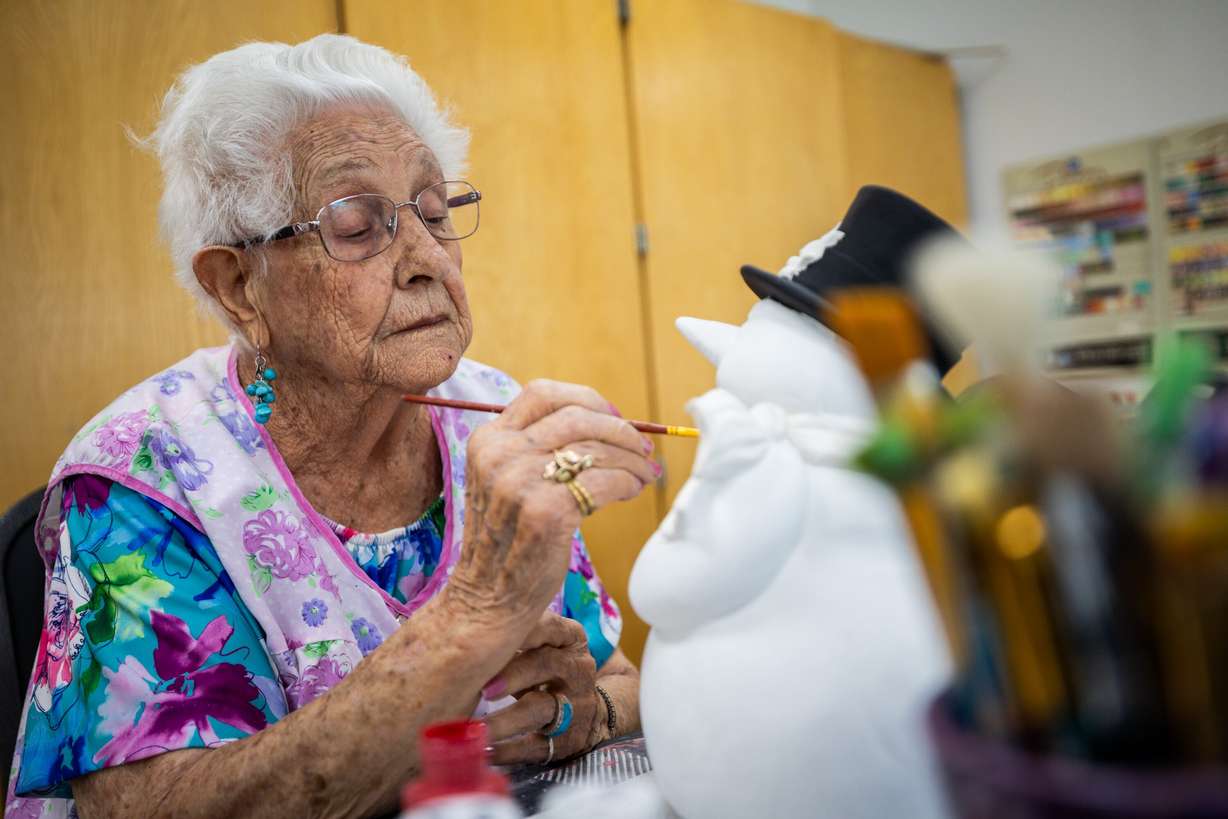 Pauline Fawcett, 96, the oldest in the class, during a senior ceramics class at the Murray City Senior Recreation Center on Thursday. Fawcett said being able to be with others at the center makes her the happiest.