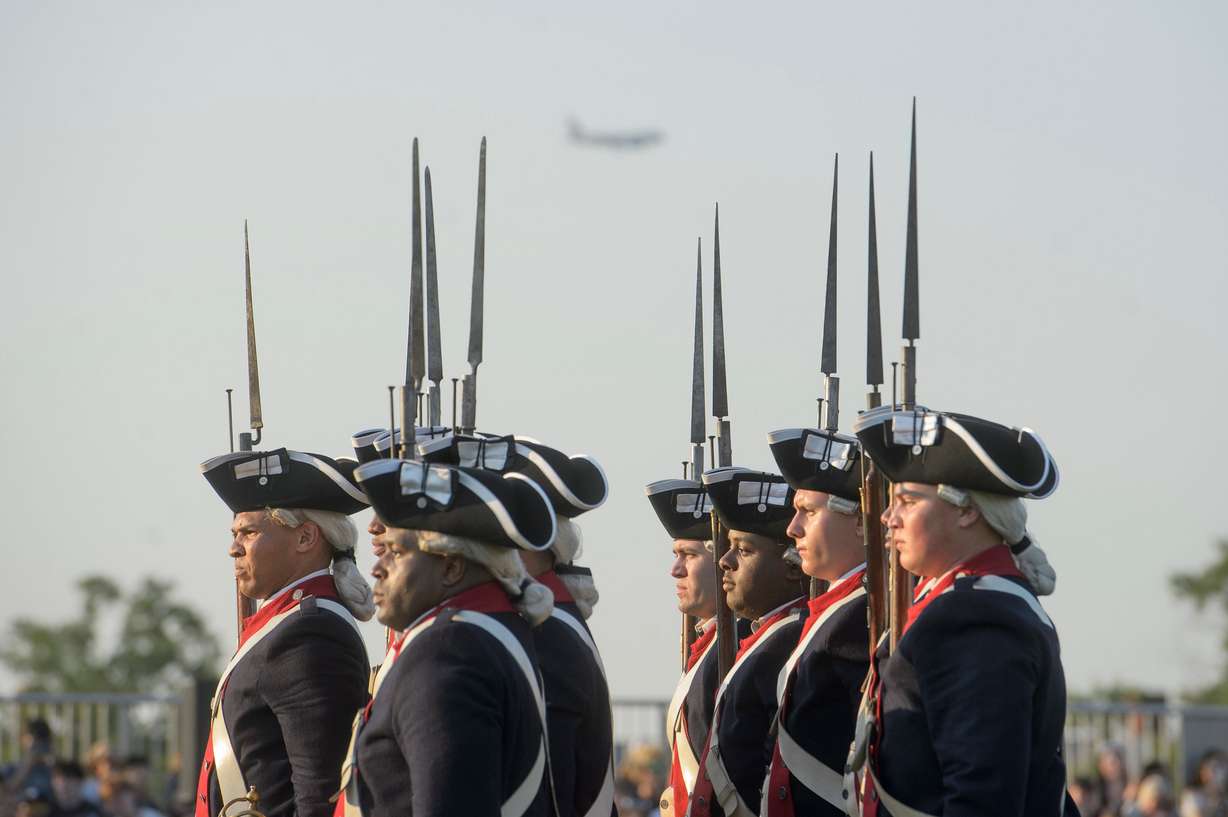 U.S. Army soldiers hold a performance as Washington's Continental Army during the Army Birthday Twilight Tattoo event at Joint Base Myer-Henderson Hall, Wednesday, in Fort Myer, Va.