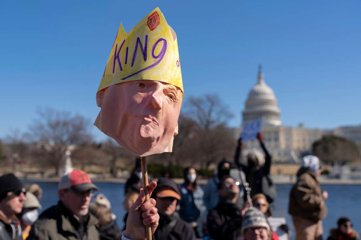 People take part in the "No Kings Day" protest on Presidents Day in Washington, in support of federal workers and against recent actions by President Donald Trump and Elon Musk, Feb. 17, by the Capitol in Washington.