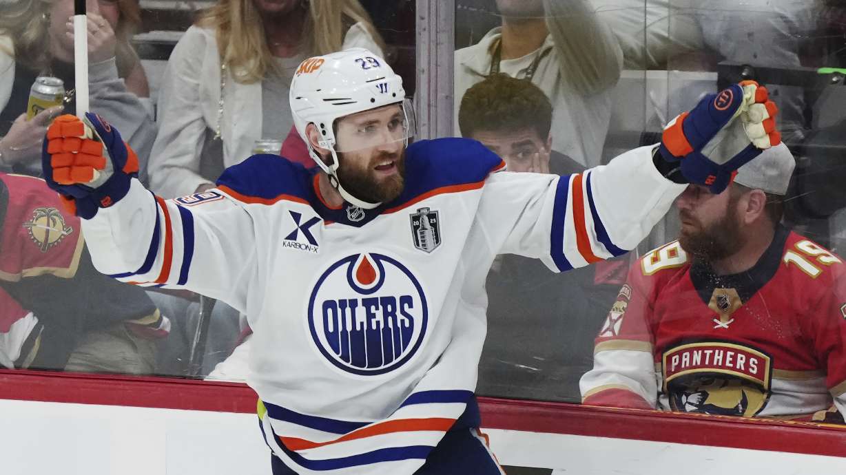 Edmonton Oilers' Leon Draisaitl (29) celebrates after his winning goal against the Florida Panthers during the first overtime period in Game 4 of the NHL hockey Stanley Cup Final in Sunrise, Fla., Thursday, June 12, 2025.