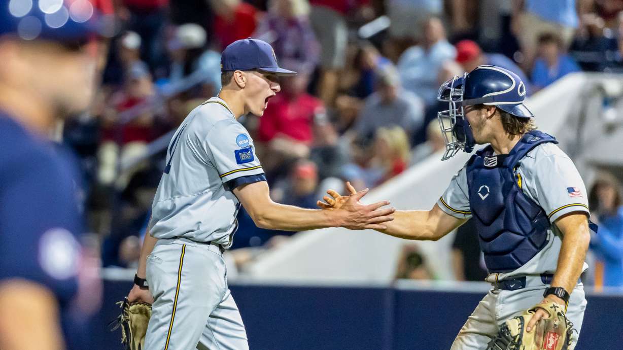FILE - Murray State pitcher Graham Kelham (41) celebrates with catcher Will Vierling (17) after a 9-6 win over Mississippi at an NCAA regional college baseball game, Friday, May 30, 2025, Oxford, Miss.