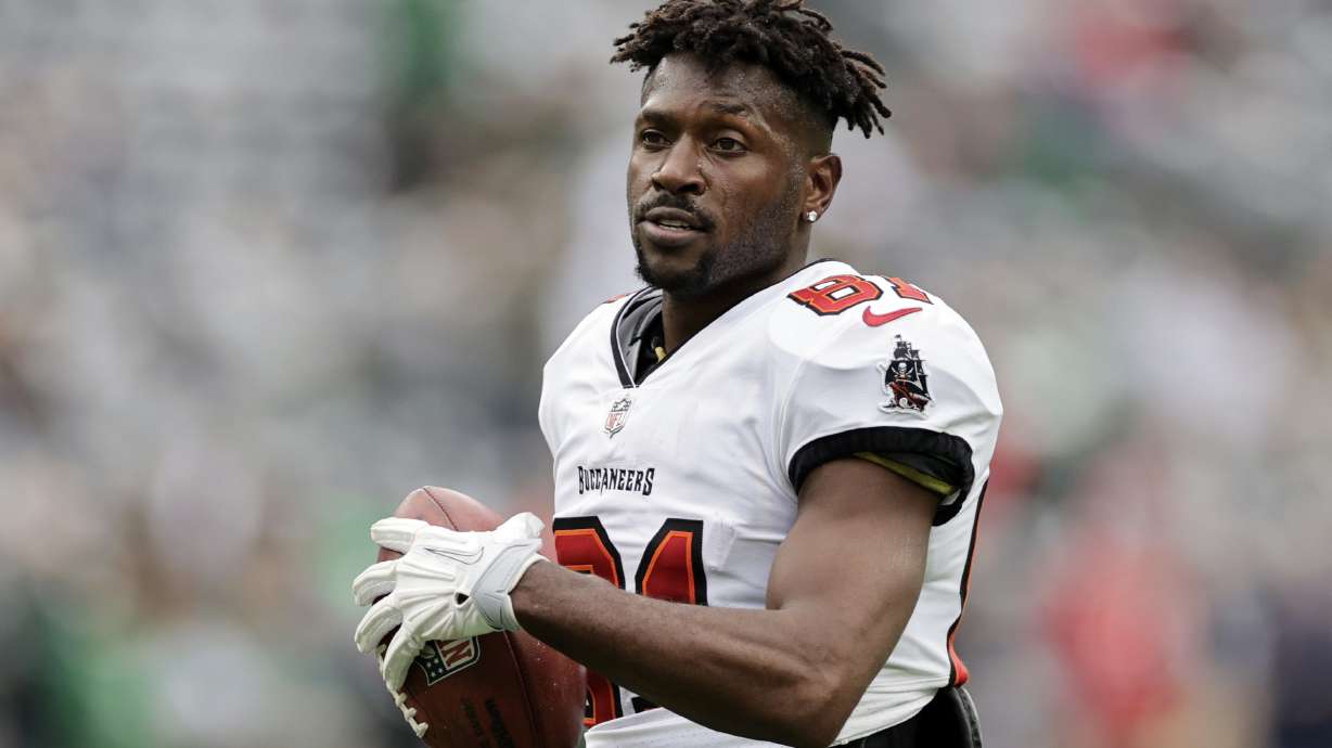 FILE - Tampa Bay Buccaneers wide receiver Antonio Brown (81) walks on the field during an NFL football game against the New York Jets, Sunday, Jan. 2, 2022, in East Rutherford, N.J.
