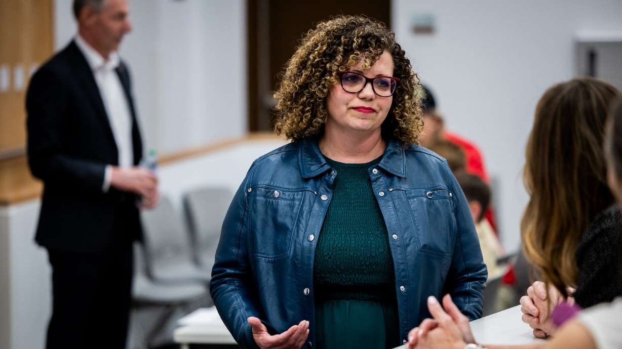 Rep. Celeste Maloy talks to attendees before a town hall at the University of Utah on March 20. Maloy is pushing back against efforts to reinstate military reimbursements for abortion travel.