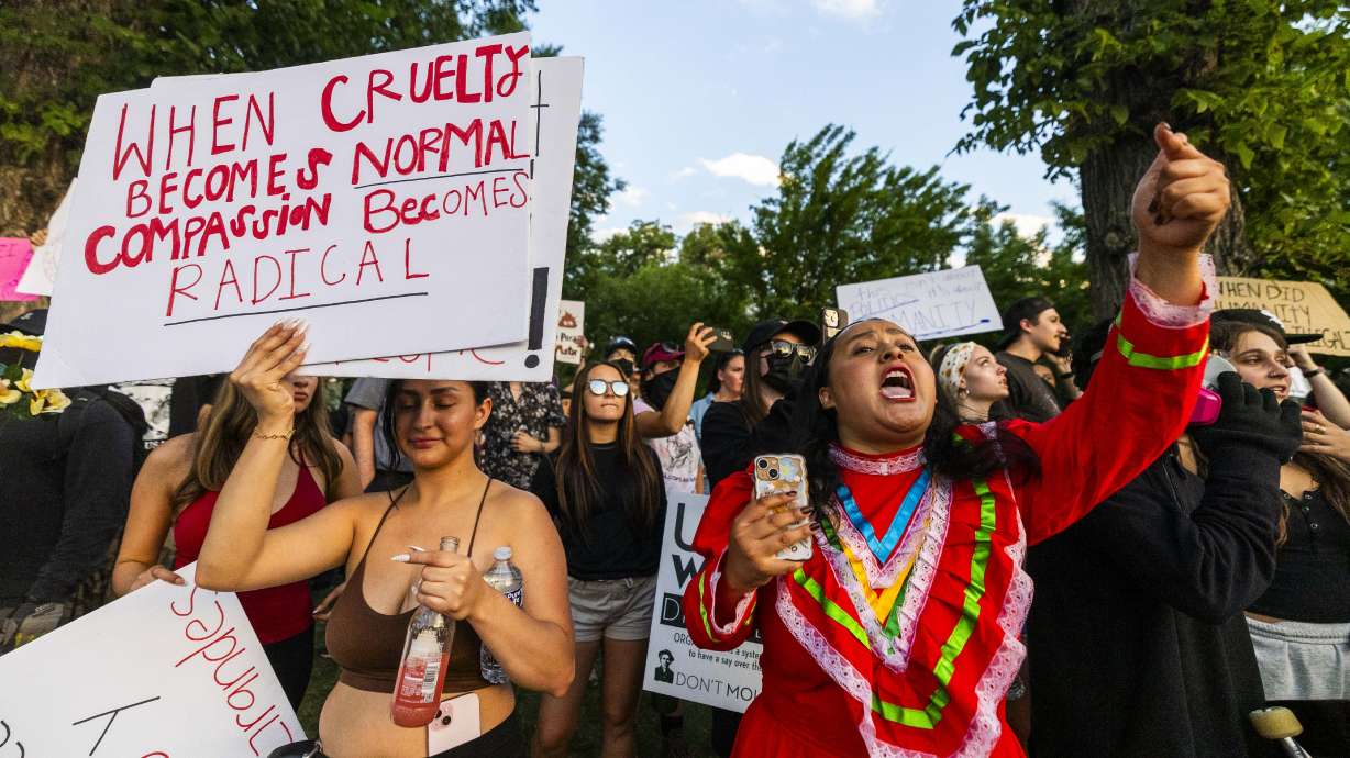 Jaz Dumas yells at a line of police officers during an anti-ICE protest in downtown Salt Lake City on Thursday. Two more demonstrations are set to take place Saturday in Salt Lake City.