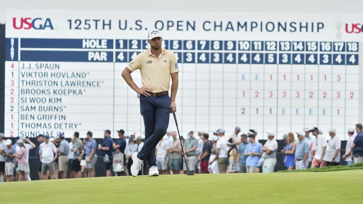 Sam Burns waits to putt on the 18th hole during the second round of the U.S. Open golf tournament at Oakmont Country Club Friday, June 13, 2025, in Oakmont, Pa.