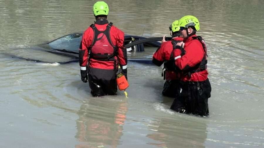 The Utah County Special Response Team trains to rescue people from a submerged car in the Jordan River on Friday. The team said car rescues like these are common during the summer.