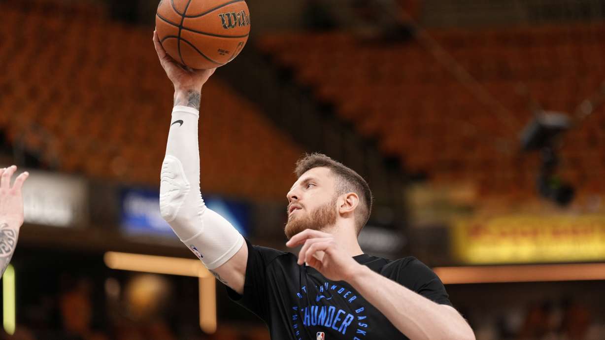 Oklahoma City Thunder center Isaiah Hartenstein warms up prior to Game 4 of the NBA Finals basketball series against the Indiana Pacers, Friday, June 13, 2025, in Indianapolis.