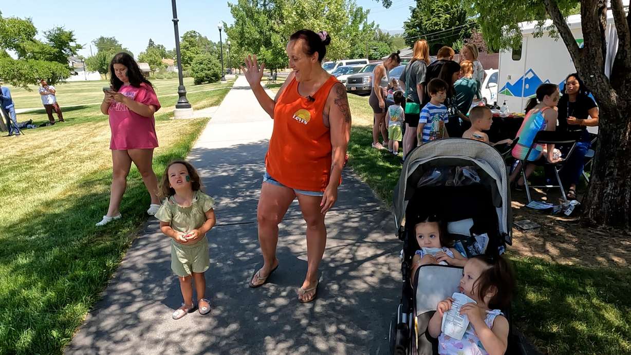 Nichole Monk, with her 3-year-old granddaughter Azalea, Friday. Monk said she was glad she ran into health department officials at Heritage Park and learned about free parenting classes they offer.