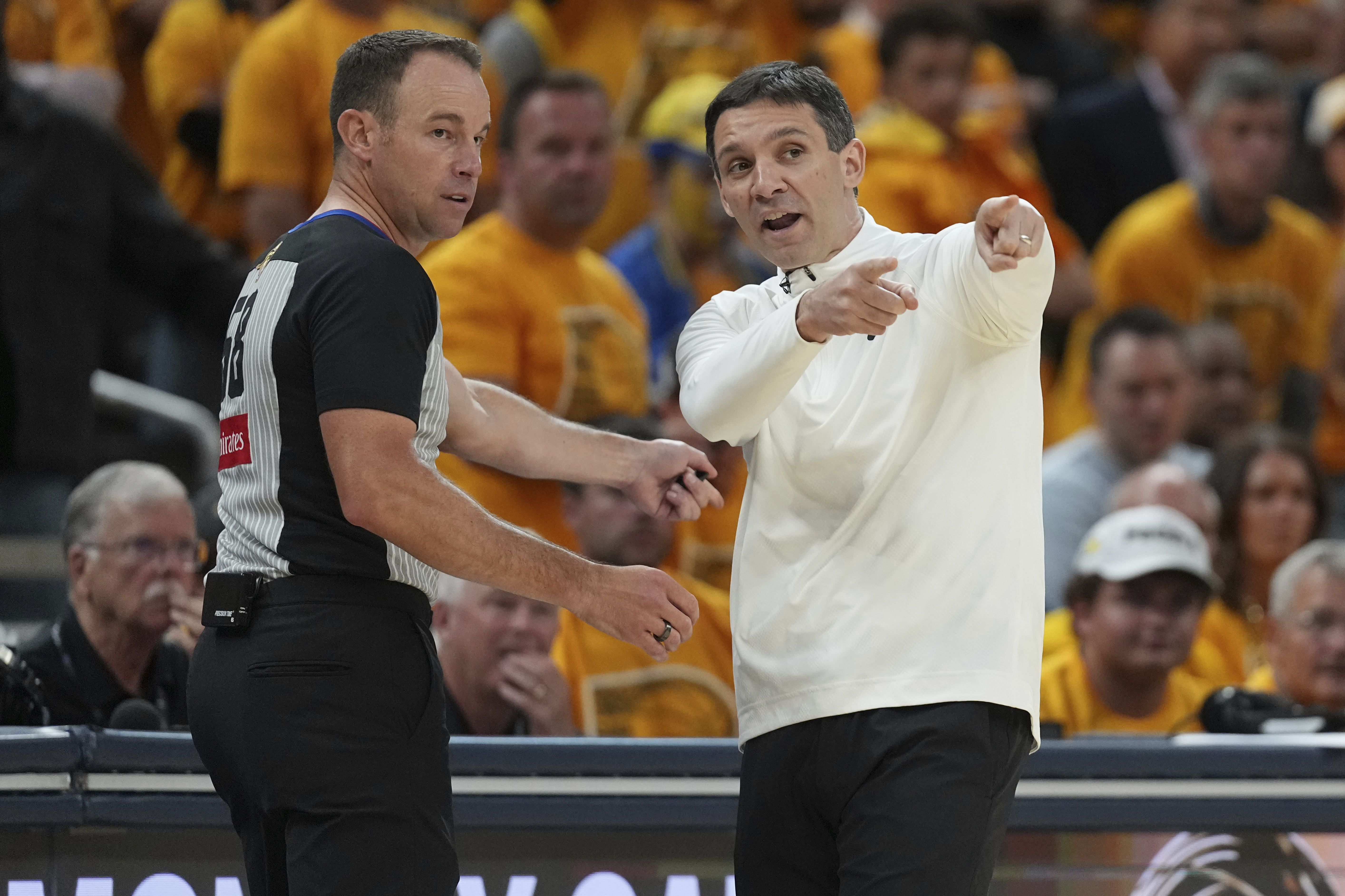 Oklahoma City Thunder head coach Mark Daigneault argues a call with the referee during the second half of Game 4 of the NBA Finals basketball series against the Indiana Pacers, Friday, June 13, 2025, in Indianapolis.