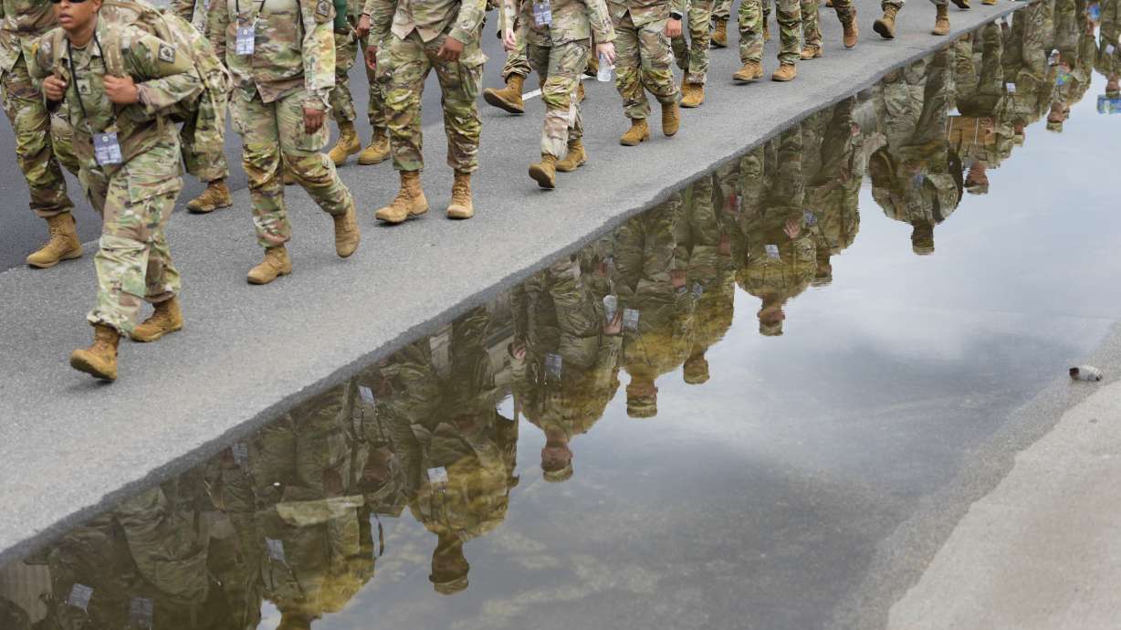 U.S. Army soldiers walk along Constitution Avenue ahead of a parade commemorating the Army's 250th anniversary, June 14, in Washington. Senate leaders questioned the Army's "ambitious" spending proposals in a subcommittee meeting on Tuesday.