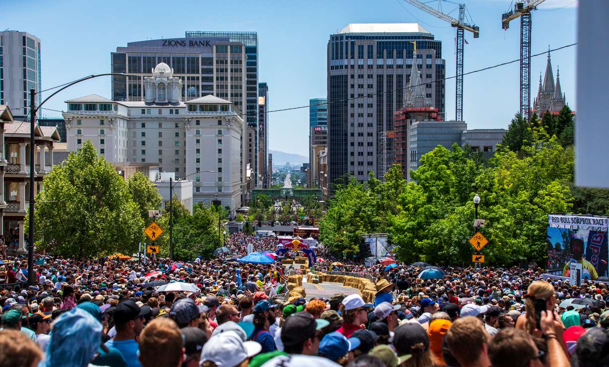 People gathered by the halfway point of the Red Bull Soapbox Race course in Salt Lake City on Saturday. About 50,000 people attended the race, according to Red Bull.