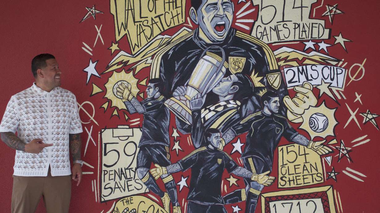 Real Salt Lake goalkeeper Nick Rimando looks at a mural in his honor before being inducted into the club's Ring of Honor, Saturday, June 15, 2025 in Sandy, Utah.