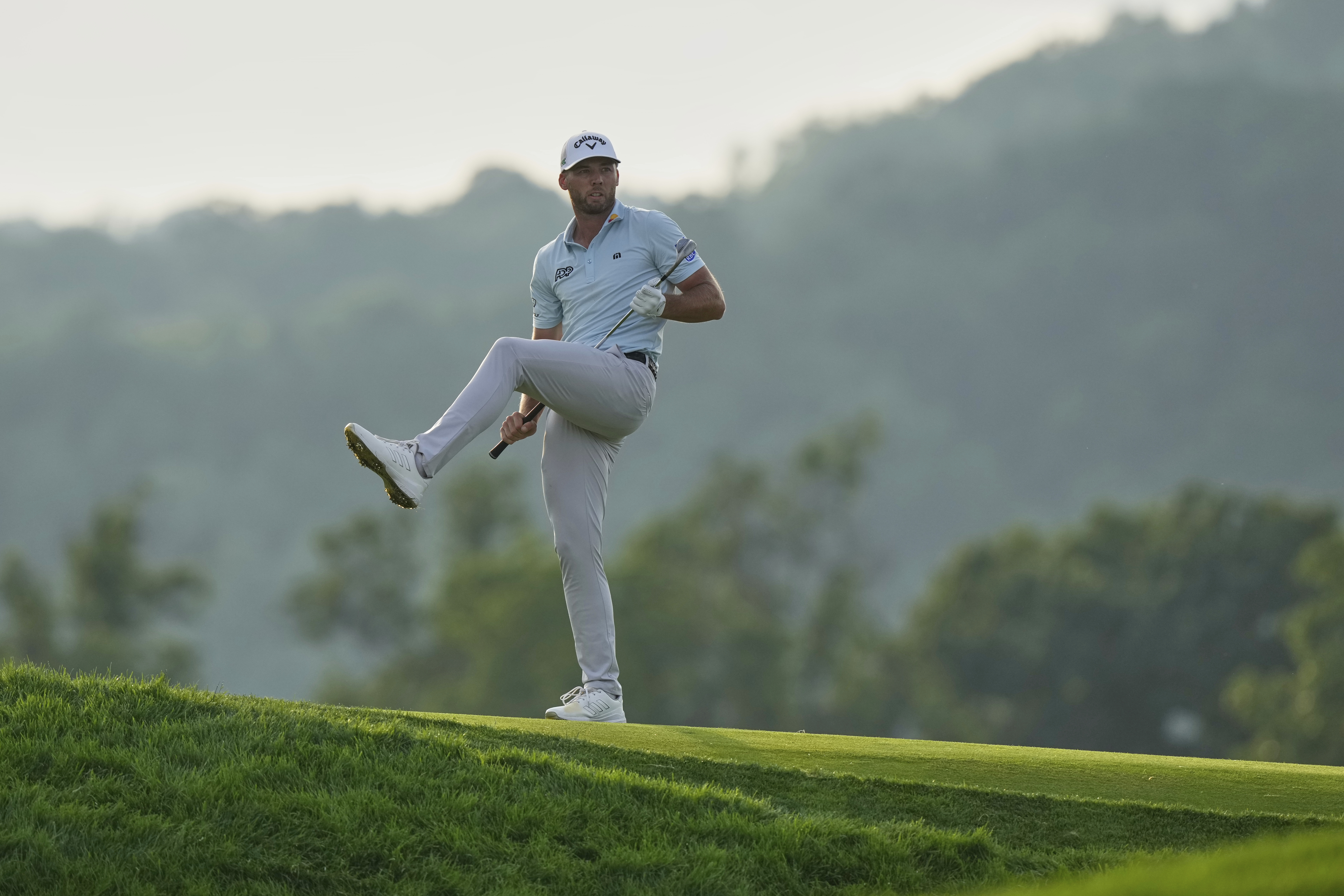 Sam Burns holds steady on soggy Oakmont to lead US Open