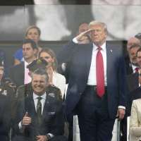 After day of nationwide protests, Trump's military parade rolls through DC