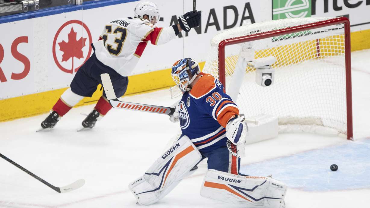 Florida Panthers' Brad Marchand (63) scores against Edmonton Oilers goalie Calvin Pickard (30) during the first period in Game 5 of the NHL hockey Stanley Cup Final in Edmonton, Alberta, Saturday, June 14, 2025.