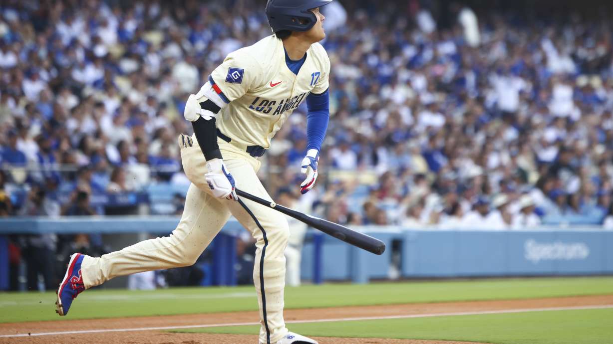 Los Angeles Dodgers designated hitter Shohei Ohtani runs after hitting a home run during the first inning of a baseball game against the San Francisco Giants in Los Angeles, Saturday, June 14, 2025.