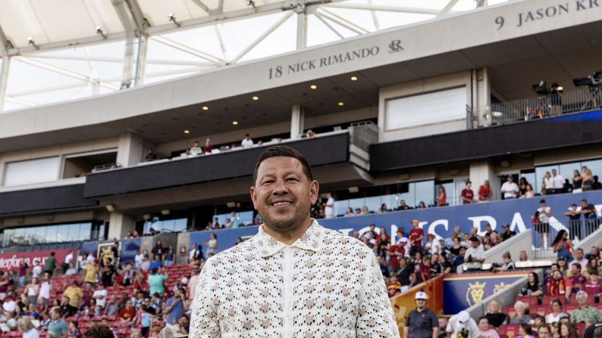 Nick Rimando poses in front of his name in the RSL Ring of Honor.
