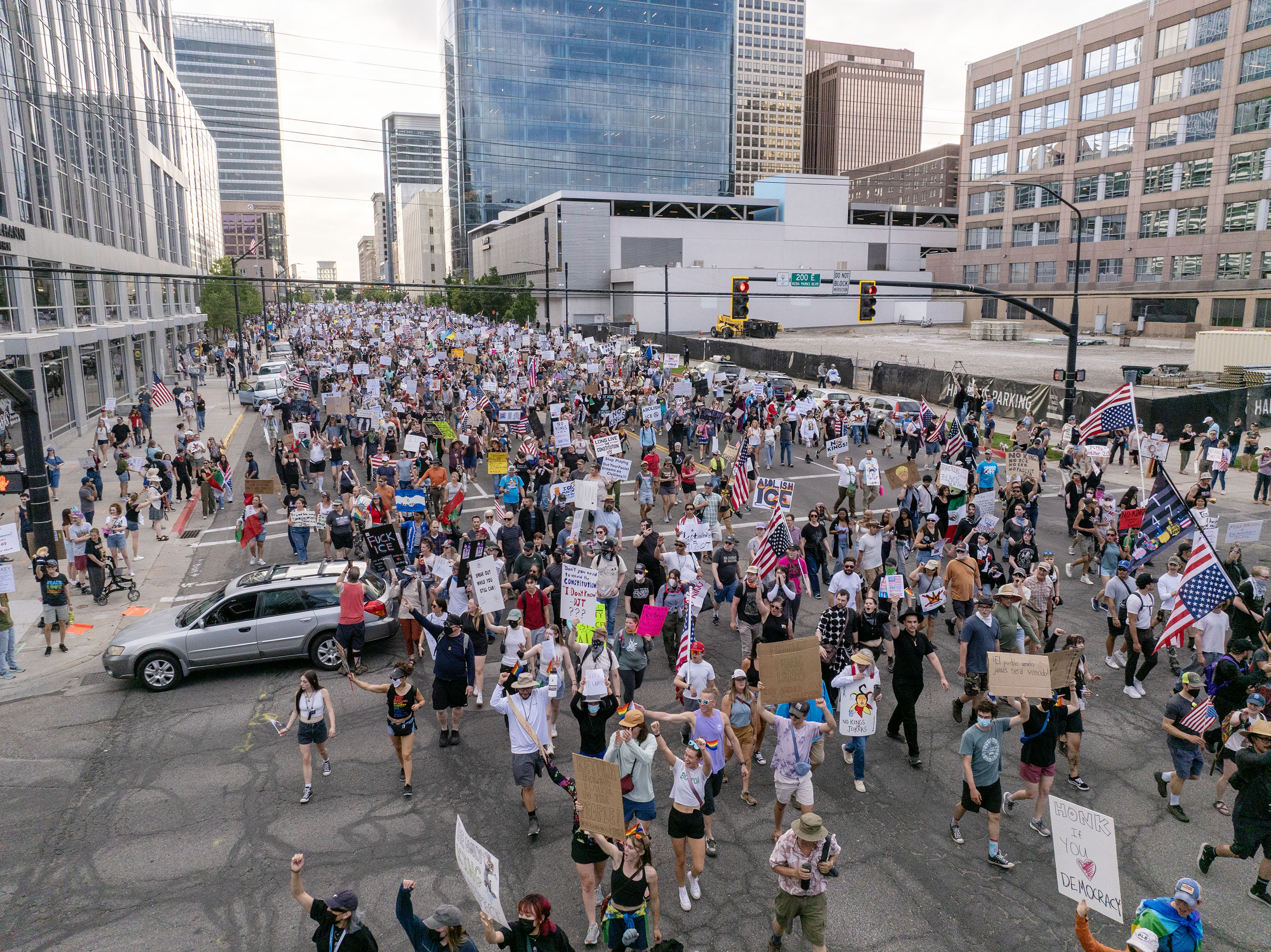 Protesters participate in a “No Kings” protest and march in Salt Lake City on Saturday.