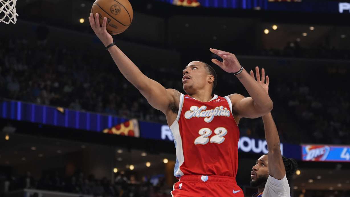 FILE - Memphis Grizzlies guard Desmond Bane (22) shoots the ball past Oklahoma City Thunder guard Isaiah Joe (11) during the first half in Game 4 of an NBA first-round playoff series, April 26, 2025, in Memphis, Tenn.