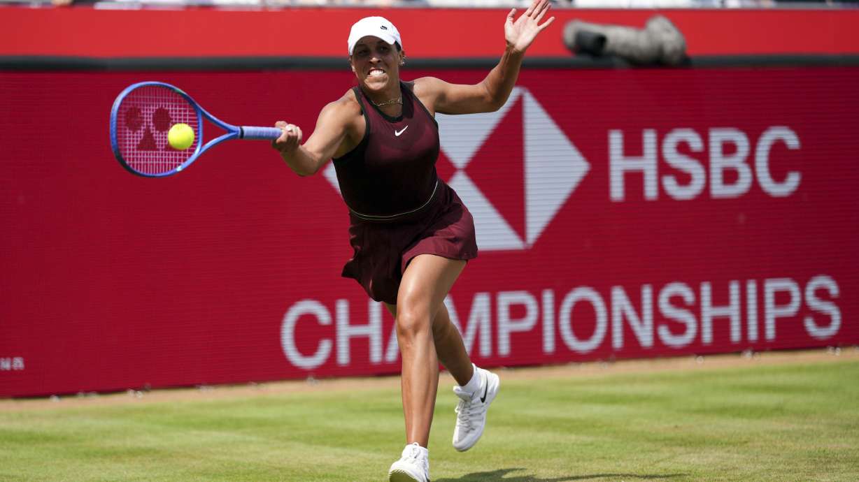Madison Keys of the U.S. returns the ball to Germany's Tatjana Maria during their semifinal match on day six of the HSBC Championships at The Queen's Club, London, Saturday June 14, 2025.