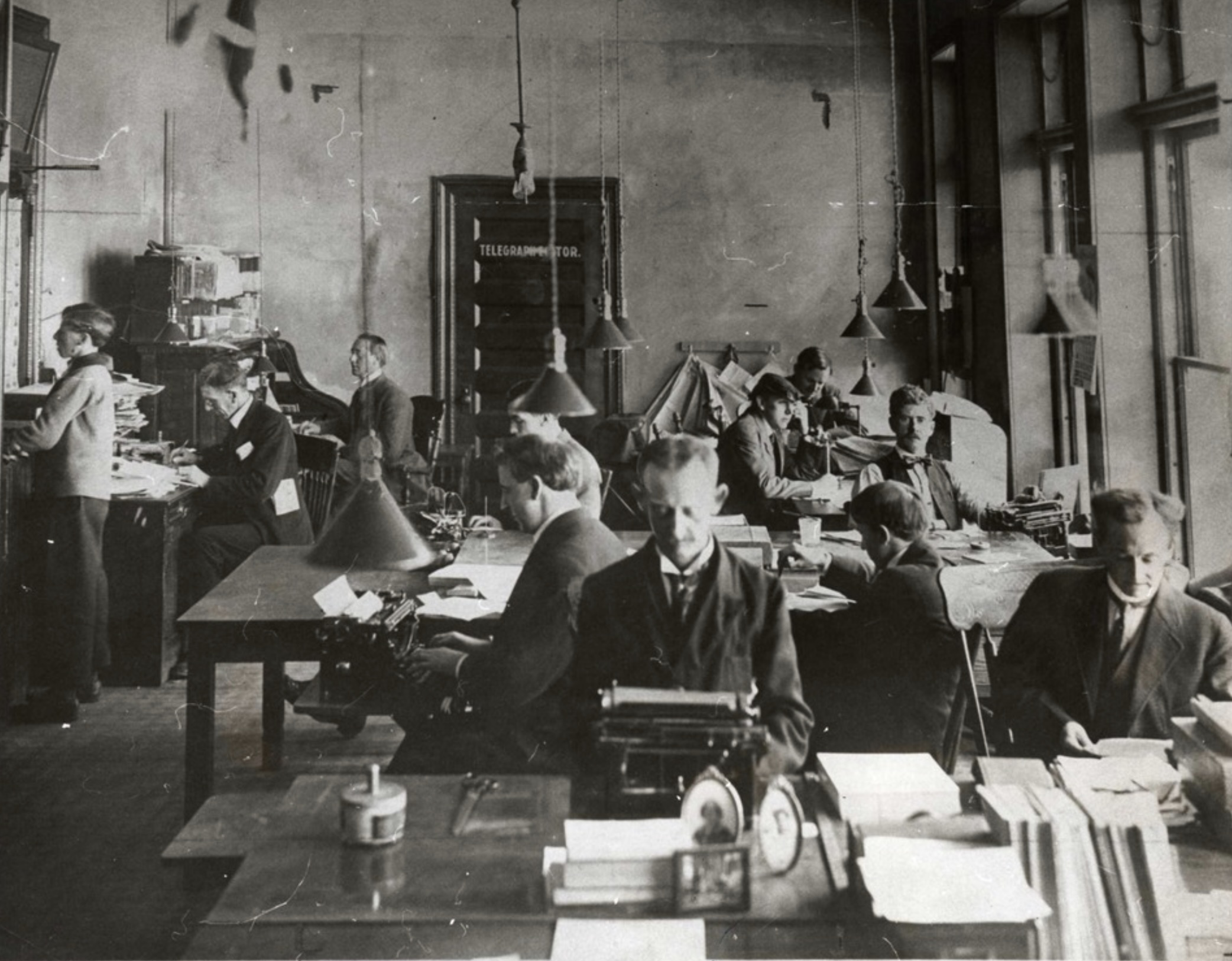 In an undated file photo, the newsroom of the Deseret News, where the "Church Section" was produced in 1931, was a busy place. Early coverage was mostly limited to talks, but soon included overseas travels of church leaders.