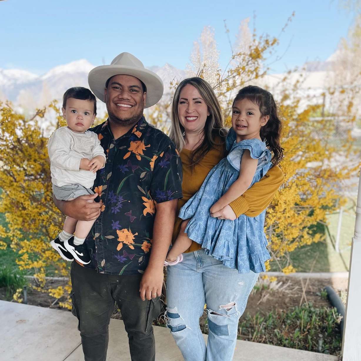 Arthur Folasa Ah Loo is pictured with his wife, Laura Ah Loo, and their two children. Arthur Folasa Ah Loo, 39, died Saturday after being shot during a "No Kings" protest and march in Salt Lake City on Saturday, police said.