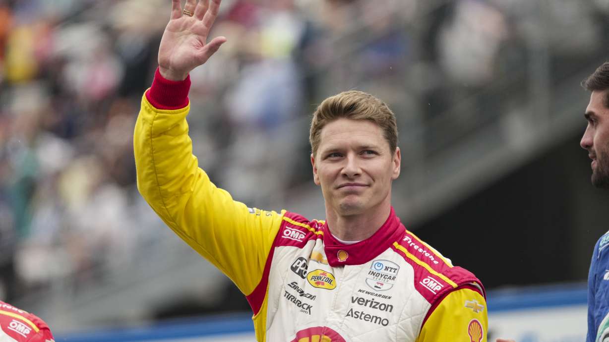 Josef Newgarden is introduced before the start of the Indianapolis 500 auto race at Indianapolis Motor Speedway in Indianapolis, Sunday, May 25, 2025.