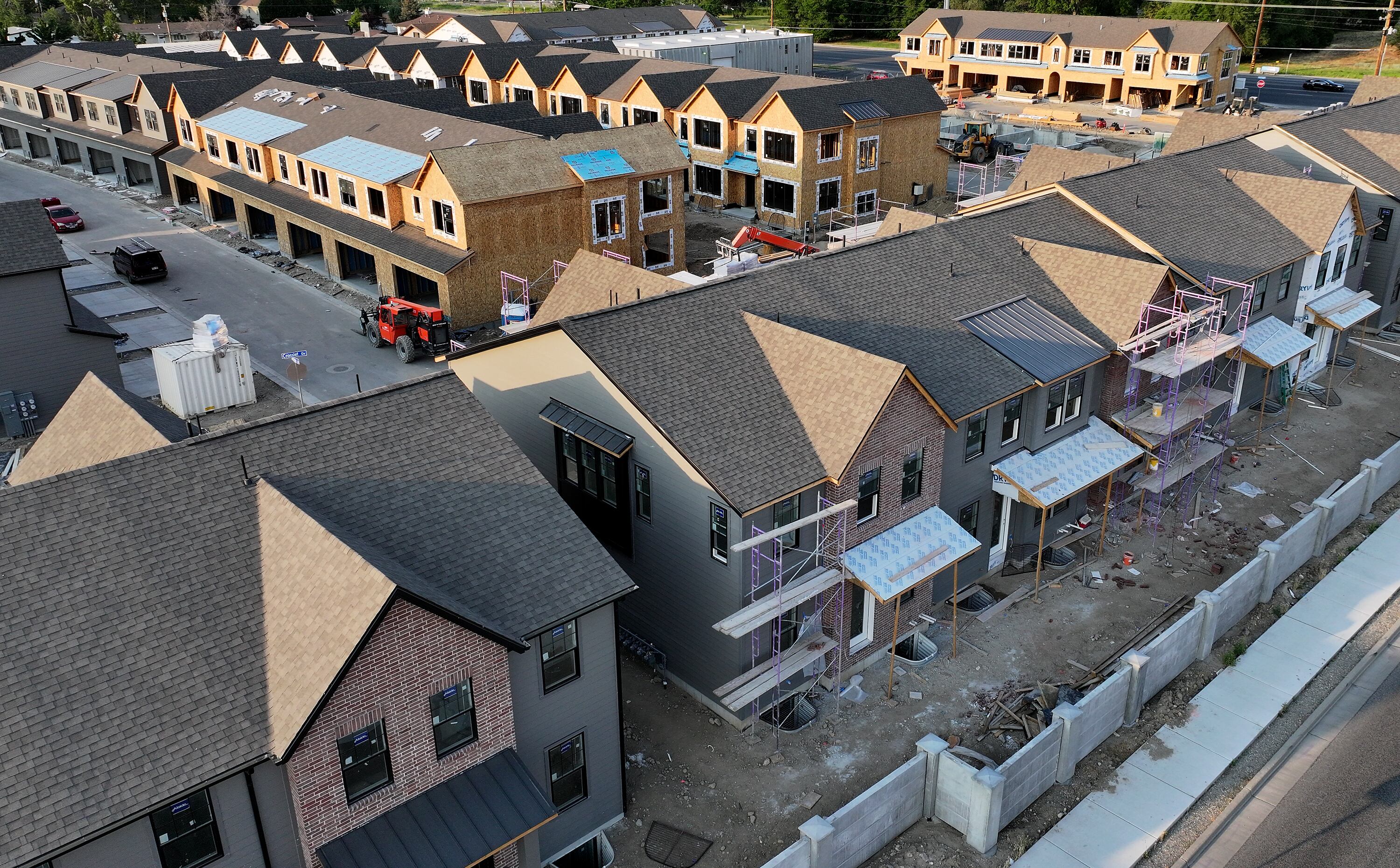 The Wheeler townhomes are pictured in Murray on June 2. Prices on U.S. goods and services inched up last month, with annual inflation coming in at a 2.4%.