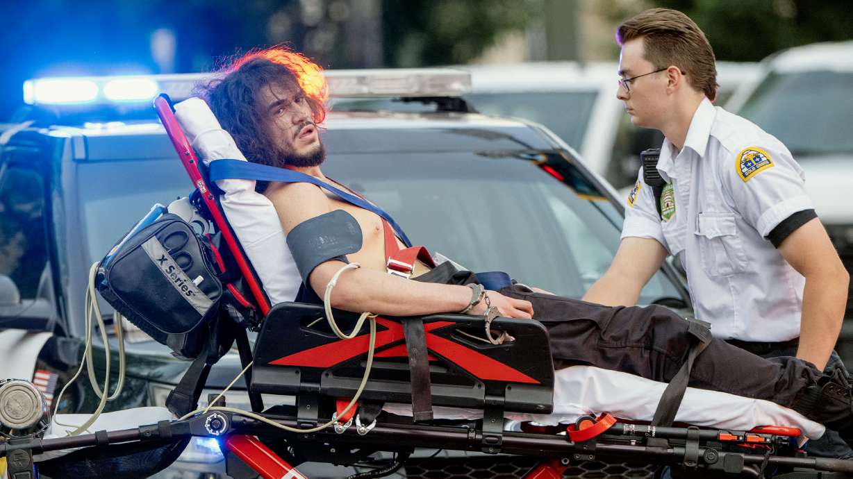 Arturo Gamboa is taken away on a gurney after being shot during the No Kings protest and march in Salt Lake City on June 14. No charges were filed against him. His attorney, Greg Skordas, spoke about the incident Tuesday.