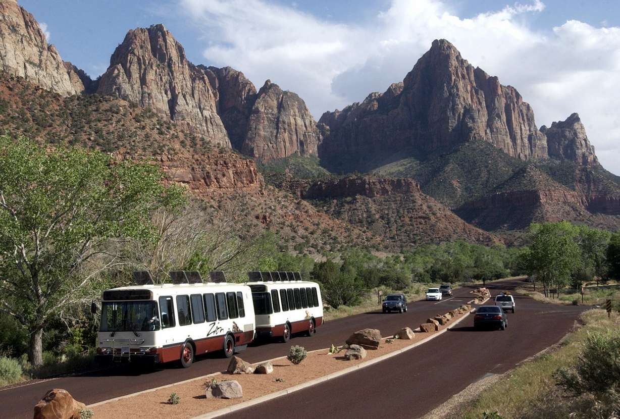 A pedestrian shuttle makes its way thorough Zion National Park on May 24, 2003.