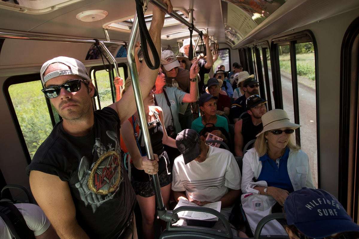 People ride a full shuttle through Zion National Park on Sept. 15, 2016.