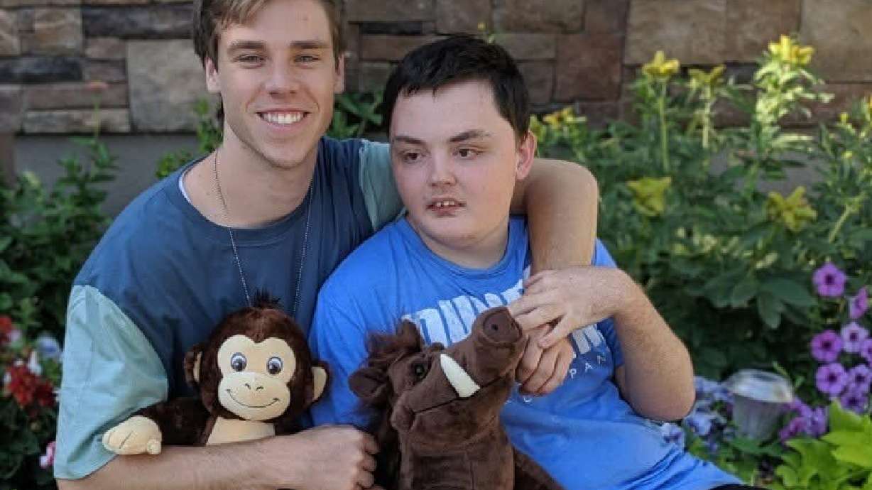 Caleb Johnson with his friend Cory Derfler. Johnson was a peer tutor for Caleb in high school, and his liver was donated to Derfler's mother.