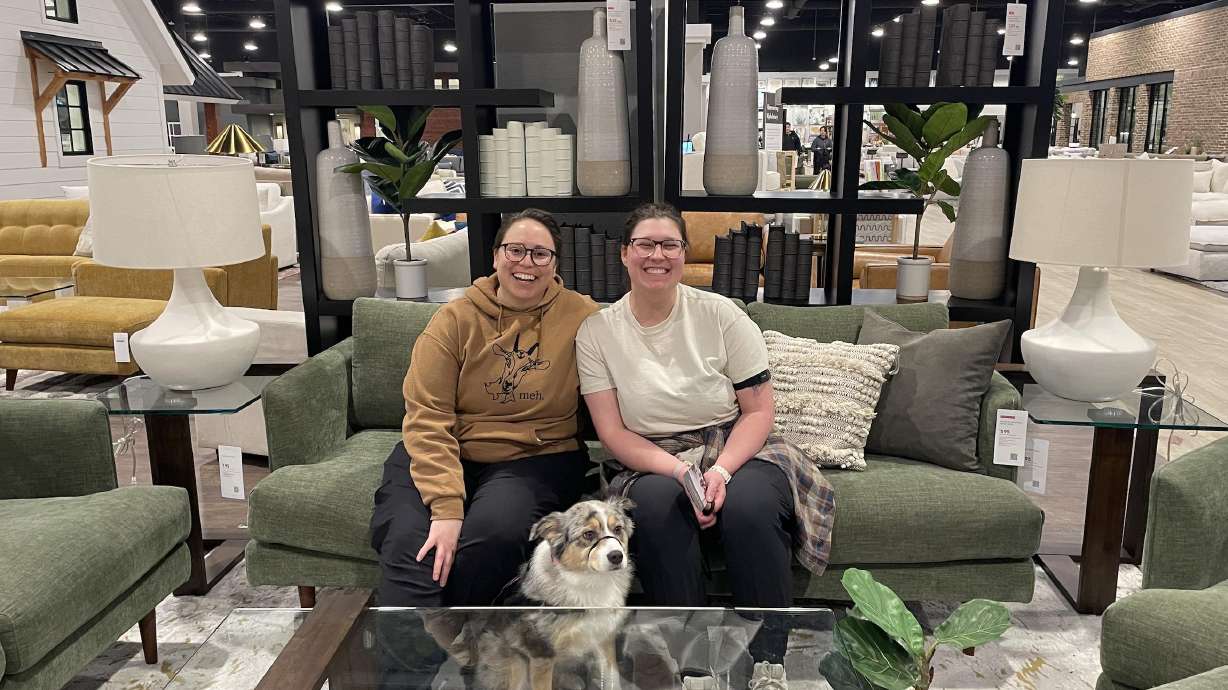 Mica Durant, left, Abigail Allred and Allred's service dog, Maisie. They have taken Maisie nearly everywhere for the past three years after she completed her training.