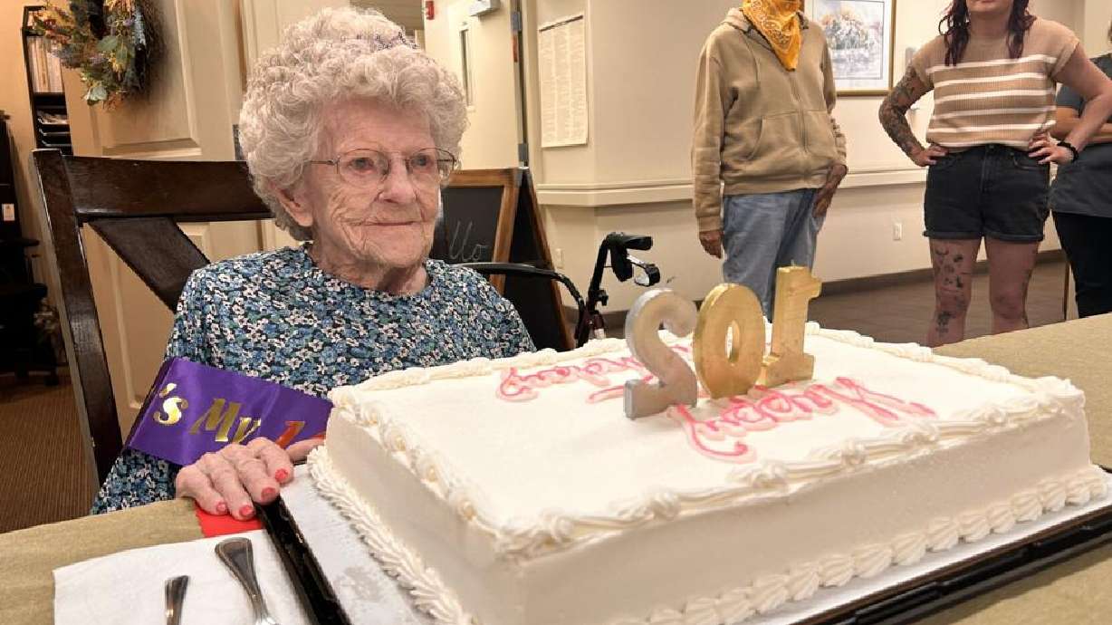Mary Lou Holtman enjoys her 102nd birthday at the Autumn Park Senior Living Center in Washington, June 13.