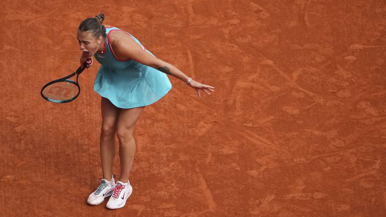 Aryna Sabalenka of Belarus yells in frustration during the final match of the French Tennis Open against Coco Gauff of the U.S. at the Roland-Garros stadium in Paris, Saturday, June 7, 2025.